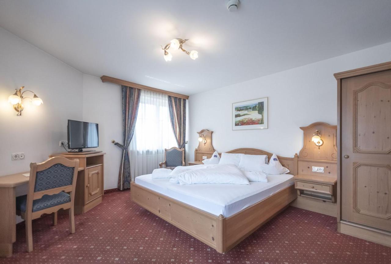 Hotel Garni Schneider Лутаґо Екстер'єр фото